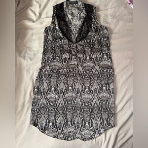 Silk blouse byAmrita Singh Black and White Patterned Sleeveless size small